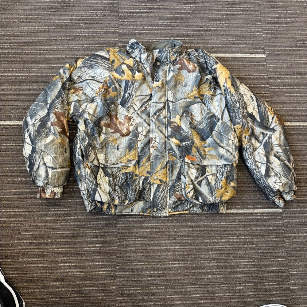 Woolrich Camouflage Puffer Jacket for Outdoor Activities